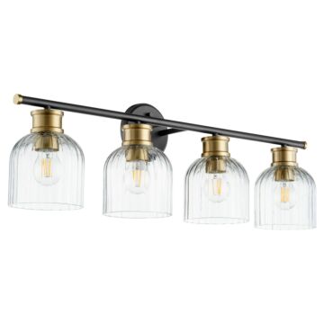 Monarch Four Light Vanity in Textured Black  Aged Brass by Quorum International