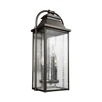 Wellsworth Three Light Lantern in Antique Bronze by Visual Comfort Studio