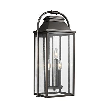 Wellsworth Three Light Lantern in Antique Bronze by Visual Comfort Studio